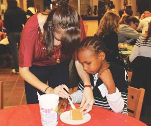 Sarah Hlusko photo: An estimated 94 children took part in Christmas on Campus.